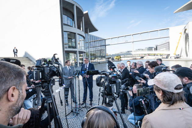 Lars Klingbeil, SPD Party Chairman and Federal Minister of Finance, and Alexander Schweitzer, Federal Minister of Labor-designate, at Friedrich-Ebert-Platz in front of the Bundestag building; introduction of the new Federal Minister of Labor on the day of his swearing-in by the SPD Party Chairman, Berlin, Germany, Friedrich-Ebert-Platz
