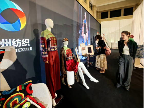 SHANGHAI, CHINA - OCTOBER 13: Models present designs featuring traditional intangible cultural heritage elements during the Shanghai Fashion Week LIVING HERITAGE event on October 13, 2026 in Shanghai, China. The season highlights contemporary adaptations of traditional crafts including Miao embroidery and wax printing from Guizhou Province.  Copyright: xVCGx 111674007423