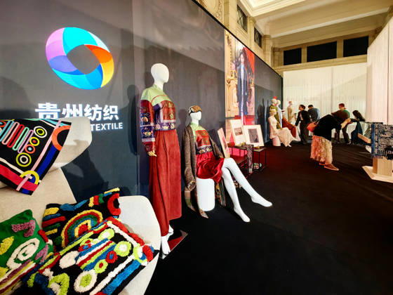 SHANGHAI, CHINA - OCTOBER 13: A model displays a contemporary fashion design incorporating traditional Miao embroidery and Dong brocade techniques during the Shanghai Fashion Week Oriental New Chinese Style Autumn 2026 series at the Shanghai History Museum on October 13, 2026 in Shanghai, China. The event features an immersive exhibition highlighting the modern adaptation of intangible cultural heritage crafts by domestic designers.  Copyright: xVCGx 111674007424