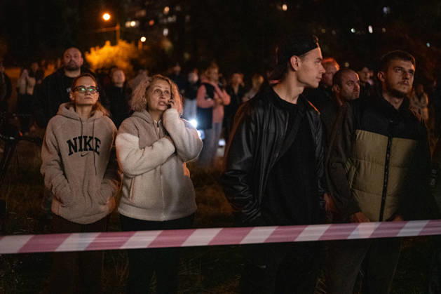 2 dead and 21 injured as Russian missile hits Kyiv residential building KYIV, UKRAINE - OCTOBER 14: Residents wait as firefighters battle a blaze at a residential building struck by a Russian ballistic missile in Kyiv s Desnianskyi district on October 14, 2026. Kyiv Mayor Vitalii Klychko reported that 2 people were killed and 21 injured in the early-morning strike, while the Ukrainian Air Force stated that allies did not provide early launch intelligence. Danylo Antoniuk Anadolu Kyiv Ukraine. Editorial use only. Please get in touch for any other usage.  Copyright: x2026xAnadoluxDanyloxAntoniukx