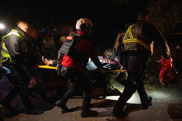 2 dead and 21 injured as Russian missile hits Kyiv residential building KYIV, UKRAINE - OCTOBER 14: Firefighters and police officers carry an injured woman on a stretcher to an ambulance near a residential building damaged by a Russian ballistic missile strike in Kyiv s Desnianskyi district on October 14, 2026. Kyiv Mayor Vitalii Klychko reported that 2 people were killed and 21 injured in the early-morning strike, while the Ukrainian Air Force stated that allies did not provide early launch intelligence. Danylo Antoniuk Anadolu Kyiv Ukraine. Editorial use only. Please get in touch for any other usage.  Copyright: x2026xAnadoluxDanyloxAntoniukx