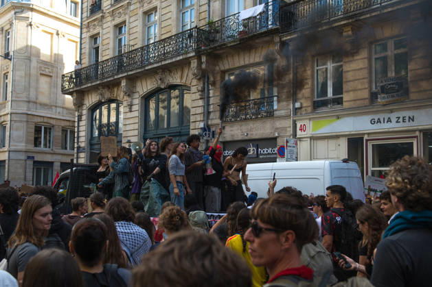 High School Stdent Mobilisation - Bordeaux Protesters gathered on a vehicle hold up placards and a smoke flare emitting black smoke during Act V of the high school student mobilisation in Bordeaux, France on October 13, 2026. Photo by Fabrice Sapte ABACAPRESS.COM Bordeaux France Copyright: xSaptexFabrice ABACAx
