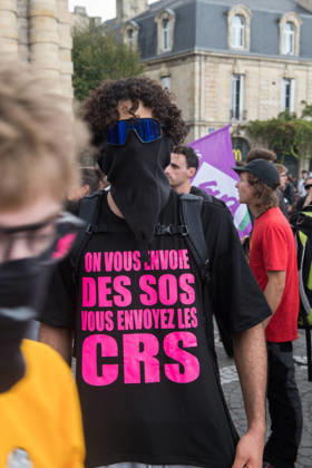 High School Stdent Mobilisation - Bordeaux A protester with their face covered wears a T-shirt reading We send you SOS calls, you send riot police during Act V of the high school student mobilisation in Bordeaux, France on October 13, 2026. Photo by Fabrice Sapte ABACAPRESS.COM Bordeaux France Copyright: xSaptexFabrice ABACAx