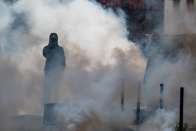 High School Stdent Mobilisation - Bordeaux A protester with their face covered and wearing protective goggles stands in a thick cloud of tear gas during Act V of the high school student mobilisation in Bordeaux, France on October 13, 2026. Photo by Fabrice Sapte ABACAPRESS.COM Bordeaux France Copyright: xSaptexFabrice ABACAx