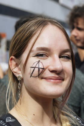 High School Student Mobilisation - Toulouse A young woman with an - A - (for anarchy) on her cheek. Act V of the secondary school and university students protests. Young people and the world of work are continuing their joint mobilisation and demands for adequate resources for education, better study conditions, an end to student precariousness, and access to housing. France, Toulouse, 13 October 2026. Photo by Patricia Huchot-Boissier AbacaPress.com. TOULOUSE OCCITANIE France  Copyright: xHuchot-BoissierxPatricia ABACAx