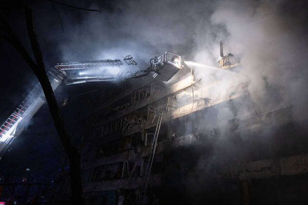 RECORD DATE NOT STATED A rescuer on an aerial platform extinguishes a fire that broke out following a Russian missile strike on a nine-story residential building in Kyiv’s Desnianskyi district, Ukraine, on October 14, 2026. Russia launched a massive ballistic missile attack on the capital. Three women were killed and 19 other people were injured in the Desnianskyi district, including a seven-year-old girl. Apartments in the nine-story building were also damaged from the first through the eighth floor (Photo by Danylo Antoniuk Ukrinform) Ballistic missile strikes next to nine-story residential building in Desnianskyi district of Kyiv  Copyright: xDanyloxAntoniukx