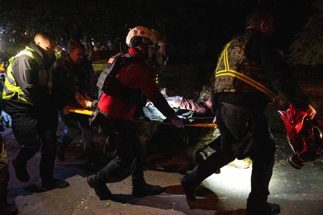 RECORD DATE NOT STATED Rescuers carry an injured person on a stretcher after a Russian missile strike on a nine-story residential building in the Desnianskyi district of Kyiv, Ukraine, on October 14, 2026. Russia launched a massive ballistic missile attack on the capital. Three women were killed and 19 people were injured in the Desnianskyi district, including a seven-year-old girl. Apartments on the first through eighth floors of the building were also damaged (Photo by Danylo Antoniuk Ukrinform) Ballistic missile strikes next to nine-story residential building in Desnianskyi district of Kyiv  Copyright: xDanyloxAntoniukx