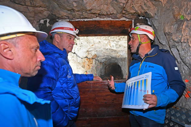 Markus SOEDER, Minister-President of Bavaria and CSU Chairman, stands in front of the entrance to a tunnel, examining the permafrost inside,which is melting year after year as a result of climate change. Minister-Preside