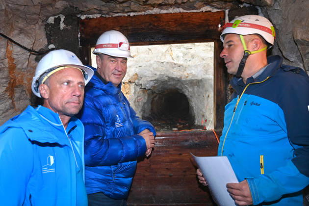 Markus SOEDER, Minister-President of Bavaria and CSU Chairman, stands in front of the entrance to a tunnel, examining the permafrost inside,which is melting year after year as a result of climate change. Minister-Preside