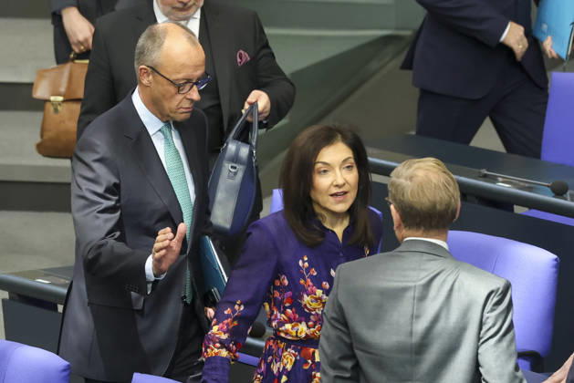 Friedrich Merz, Katherina Reiche, and Johann Wadephul at the session of the German Bundestag on October 14, 2026, in Berlin; Chancellor Merz delivering the government statement to the German Bundestag