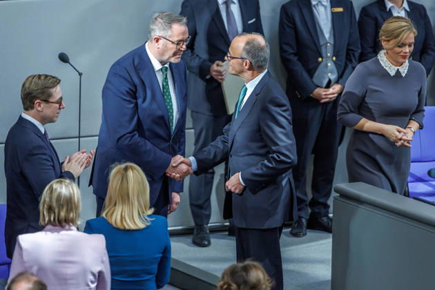 Bundestag: Federal Chancellor Friedrich Merz (CDU) and Alexander Schweitzer (SPD), Federal Minister of Labor and Social Affairs, after being sworn in at the German Bundestag on October 14, 2026, in Berlin, Berlin, Berlin, Germany, Bundestag