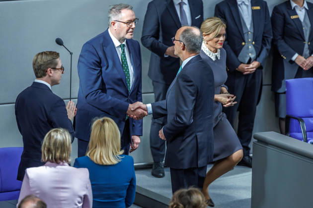 Bundestag: Federal Chancellor Friedrich Merz (CDU) and Alexander Schweitzer (SPD), Federal Minister of Labor and Social Affairs, after being sworn in at the German Bundestag on October 14, 2026, in Berlin, Berlin, Berlin, Germany, Bundestag
