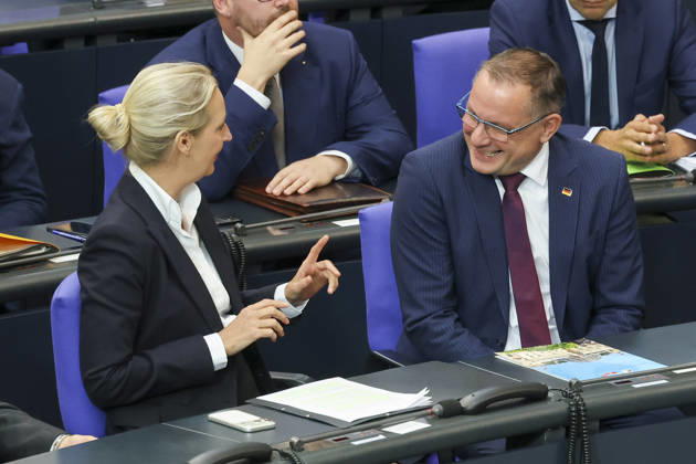 Alice Weidel and Tino Chrupalla at the session of the German Bundestag on October 14, 2026, in Berlin; Chancellor Merz delivering the government statement in the German Bundestag