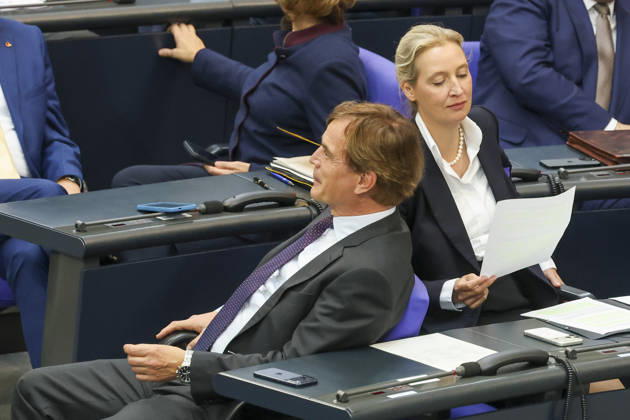 Bernd Baumann and Alice Weidel at the session of the German Bundestag on October 14, 2026, in Berlin; Chancellor Merz delivering the government’s policy statement to the German Bundestag