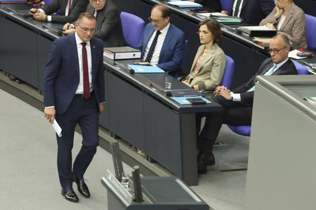 Tino Chrupalla and Friedrich Merz at the session of the German Bundestag on October 14, 2026, in Berlin; Chancellor Merz delivering the government’s policy statement to the German Bundestag