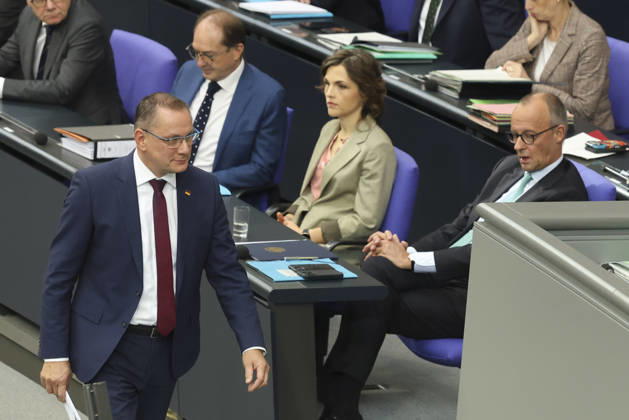Tino Chrupalla and Friedrich Merz at the session of the German Bundestag on October 14, 2026, in Berlin; Chancellor Merz delivering the government’s policy statement to the German Bundestag
