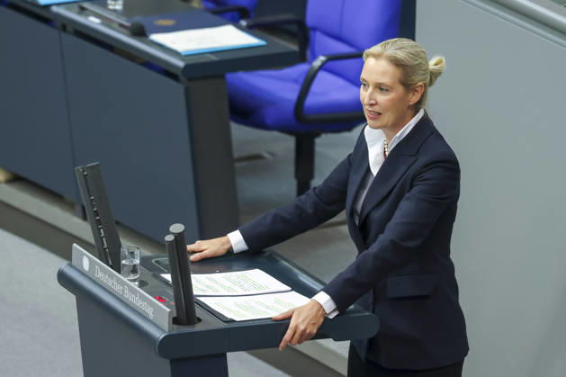 Alice Weidel at the session of the German Bundestag on October 14, 2026, in Berlin; Chancellor Merz delivering the government’s policy statement to the German Bundestag