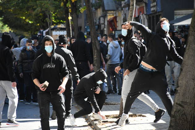 Clashes erupt outside Ministry of Education in Tirana during student protest over academic conditions TIRANA, ALBANIA - OCTOBER 14: University students stage protest outside the Ministry of Education building in Tirana, Albania, on October 14, 2026. A protest organized by university students demanding improvements to educational infrastructure and funding escalated into violent clashes as civic supporters joined the crowds. Demonstrators hurled Molotov cocktails, stones, and improvised projectiles at the ministry and law enforcement officers, setting fire to trash containers. In response, law enforcement officers used water cannons and tear gas to disperse the protesters. Olsi Shehu Anadolu Tirana Albania. Editorial use only. Please get i  Copyright: x2026xAnadoluxOlsixShehux