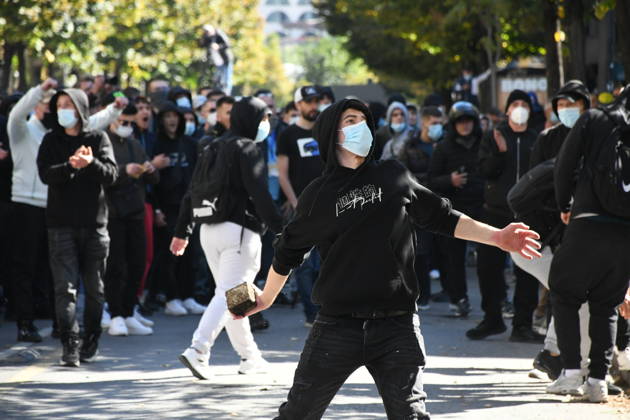 Clashes erupt outside Ministry of Education in Tirana during student protest over academic conditions TIRANA, ALBANIA - OCTOBER 14: University students stage protest outside the Ministry of Education building in Tirana, Albania, on October 14, 2026. A protest organized by university students demanding improvements to educational infrastructure and funding escalated into violent clashes as civic supporters joined the crowds. Demonstrators hurled Molotov cocktails, stones, and improvised projectiles at the ministry and law enforcement officers, setting fire to trash containers. In response, law enforcement officers used water cannons and tear gas to disperse the protesters. Olsi Shehu Anadolu Tirana Albania. Editorial use only. Please get i  Copyright: x2026xAnadoluxOlsixShehux