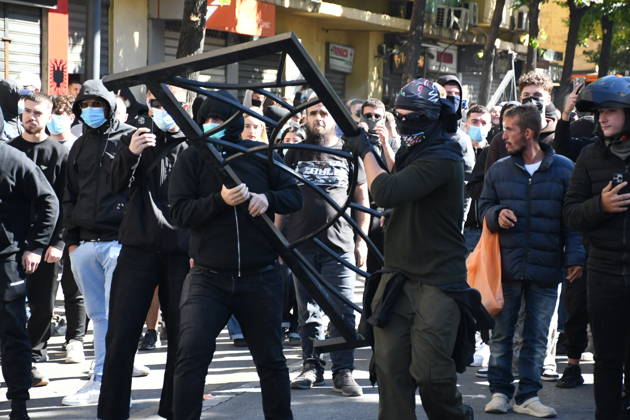 Clashes erupt outside Ministry of Education in Tirana during student protest over academic conditions TIRANA, ALBANIA - OCTOBER 14: University students stage protest outside the Ministry of Education building in Tirana, Albania, on October 14, 2026. A protest organized by university students demanding improvements to educational infrastructure and funding escalated into violent clashes as civic supporters joined the crowds. Demonstrators hurled Molotov cocktails, stones, and improvised projectiles at the ministry and law enforcement officers, setting fire to trash containers. In response, law enforcement officers used water cannons and tear gas to disperse the protesters. Olsi Shehu Anadolu Tirana Albania. Editorial use only. Please get i  Copyright: x2026xAnadoluxOlsixShehux
