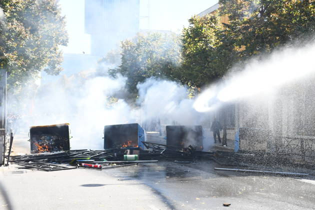 Clashes erupt outside Ministry of Education in Tirana during student protest over academic conditions TIRANA, ALBANIA - OCTOBER 14: University students stage protest outside the Ministry of Education building in Tirana, Albania, on October 14, 2026. A protest organized by university students demanding improvements to educational infrastructure and funding escalated into violent clashes as civic supporters joined the crowds. Demonstrators hurled Molotov cocktails, stones, and improvised projectiles at the ministry and law enforcement officers, setting fire to trash containers. In response, law enforcement officers used water cannons and tear gas to disperse the protesters. Olsi Shehu Anadolu Tirana Albania. Editorial use only. Please get i  Copyright: x2026xAnadoluxOlsixShehux