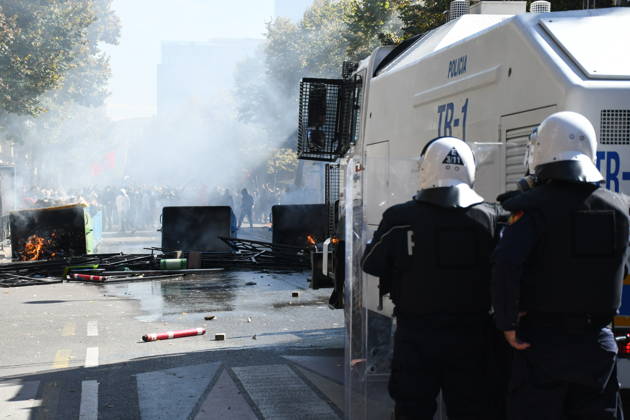 Clashes erupt outside Ministry of Education in Tirana during student protest over academic conditions TIRANA, ALBANIA - OCTOBER 14: University students stage protest outside the Ministry of Education building in Tirana, Albania, on October 14, 2026. A protest organized by university students demanding improvements to educational infrastructure and funding escalated into violent clashes as civic supporters joined the crowds. Demonstrators hurled Molotov cocktails, stones, and improvised projectiles at the ministry and law enforcement officers, setting fire to trash containers. In response, law enforcement officers used water cannons and tear gas to disperse the protesters. Olsi Shehu Anadolu Tirana Albania. Editorial use only. Please get i  Copyright: x2026xAnadoluxOlsixShehux