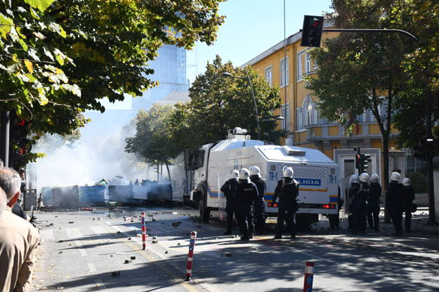 Clashes erupt outside Ministry of Education in Tirana during student protest over academic conditions TIRANA, ALBANIA - OCTOBER 14: University students stage protest outside the Ministry of Education building in Tirana, Albania, on October 14, 2026. A protest organized by university students demanding improvements to educational infrastructure and funding escalated into violent clashes as civic supporters joined the crowds. Demonstrators hurled Molotov cocktails, stones, and improvised projectiles at the ministry and law enforcement officers, setting fire to trash containers. In response, law enforcement officers used water cannons and tear gas to disperse the protesters. Olsi Shehu Anadolu Tirana Albania. Editorial use only. Please get i  Copyright: x2026xAnadoluxOlsixShehux