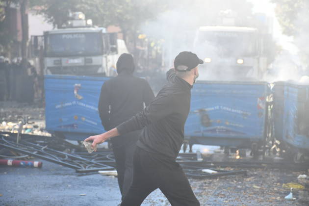 Clashes erupt outside Ministry of Education in Tirana during student protest over academic conditions TIRANA, ALBANIA - OCTOBER 14: University students stage protest outside the Ministry of Education building in Tirana, Albania, on October 14, 2026. A protest organized by university students demanding improvements to educational infrastructure and funding escalated into violent clashes as civic supporters joined the crowds. Demonstrators hurled Molotov cocktails, stones, and improvised projectiles at the ministry and law enforcement officers, setting fire to trash containers. In response, law enforcement officers used water cannons and tear gas to disperse the protesters. Olsi Shehu Anadolu Tirana Albania. Editorial use only. Please get i  Copyright: x2026xAnadoluxOlsixShehux