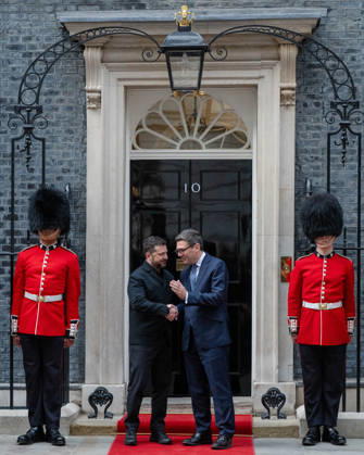 October 14, 2026, London, England, United Kingdom: British Prime Minister Andy BURNHAM welcomes Ukrainian President Volodymyr ZELENSKYY outside 10 Downing Street in London, United Kingdom, ahead of their meeting to discuss support for Ukraine. London United Kingdom  - ZUMAk172 20261014_zip_k172_077 Copyright: xThomasxKrychx