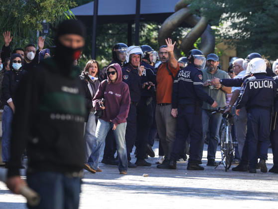 October 14, 2026, Tirana, Tirana, Albania: Arlind Qorri, leader of Movement Together (Levizja Bashke), a left-wing political party, gesture during a students protest in front of Education Ministry in Tirana, Albania, on 14 October, 2026. Students are in the second day of their protest calling for better education conditions and the resignation of Prime Minister Edi Rama. Movement Together (Levizja Bashke) was founded in 2022 by the political group Organizata Politike (Political Organisation) after 12 years of activism in social struggles and in solidarity with workers, students and citizens.....Students throw stones to police in front of Education Ministry in Tirana, Albania, on October 14, 2026. Students are in the second day of their prot - ZUMAb266 20261014_zip_b266_001 Copyright: xArmandoxBabanix
