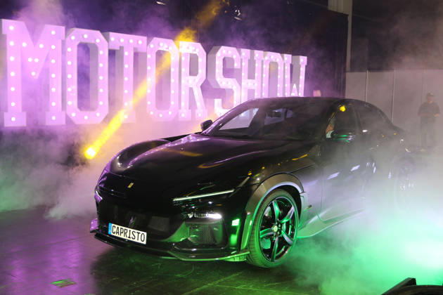 A 2026 Ferrari Purosangue from exhibitor Capristo Automotive in artificial fog, Media event: Carwalk for the Essen Motor Show on October 14, 2026, at Messe Essen in the lead-up to the Essen Motor Show 2026 (November 28, 2026 – December 6, 2026), EMS Preview on November 27, 2026