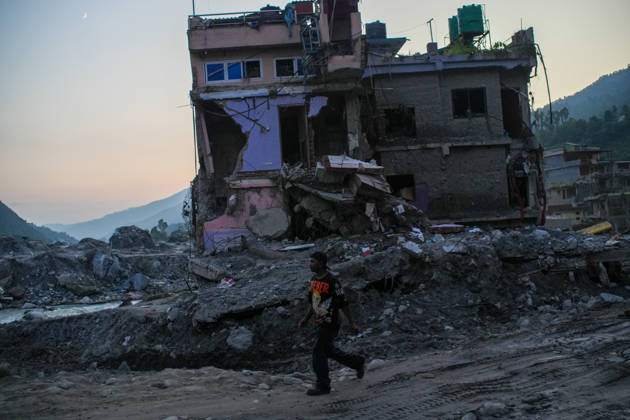 Aftermath of flash floods in Nepal RASUWA, NEPAL - OCTOBER 14 : Houses damaged by devastating flash floods are seen in Rasuwa dristrict, Nepal on October 14, 2026. Road and pedestrian connectivity has been restored with the construction of a new suspension bridge over the Trishuli River, allowing local residents to cross the river after the devastating floods damaged bridges and other infrastructure in the area. Sunil Pradhan Anadolu Rasuwa Nepal. Editorial use only. Please get in touch for any other usage.  Copyright: x2026xAnadoluxSunilxPradhanx