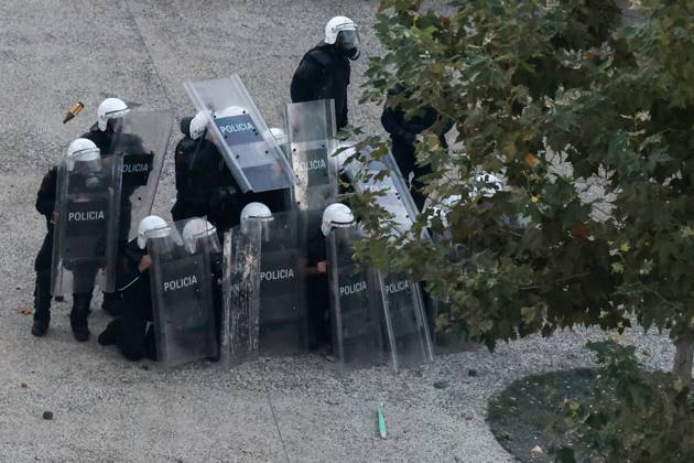 October 14, 2026, Tirana, Albania: TIRANA, ALBANIA, OCTOBER 14, 2026: Demonstrators clash with riot police during student-led protests over rising education costs, university conditions and alleged corruption in Tirana. Fires damage the Ministry of Education and bank premises as protesters throw stones and other objects, while police use tear gas and water cannons. Tirana Albania - ZUMAq101 20261014_zna_q101_281 Copyright: xVlasovxSulajx