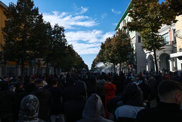 October 14, 2026, Tirana, Albania: TIRANA, ALBANIA, OCTOBER 14, 2026: Demonstrators clash with riot police during student-led protests over rising education costs, university conditions and alleged corruption in Tirana. Fires damage the Ministry of Education and bank premises as protesters throw stones and other objects, while police use tear gas and water cannons. Tirana Albania - ZUMAq101 20261014_zna_q101_283 Copyright: xVlasovxSulajx