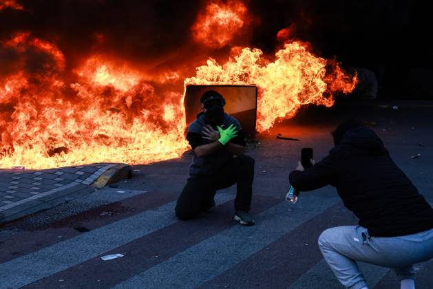 October 14, 2026, Tirana, Albania: TIRANA, ALBANIA, OCTOBER 14, 2026: Demonstrators clash with riot police during student-led protests over rising education costs, university conditions and alleged corruption in Tirana. Fires damage the Ministry of Education and bank premises as protesters throw stones and other objects, while police use tear gas and water cannons. Tirana Albania - ZUMAq101 20261014_zna_q101_293 Copyright: xVlasovxSulajx