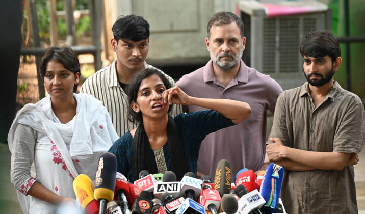 NEW DELHI, INDIA - OCTOBER 14: NSUI members speaks with media alongwith LOP Lok Sabha and Congress MP Rahul Gandhi during press conference regarding injured NSUI Members and others in the Delhi Police crackdown at Akbar Road on October 14, 2026 in New Delhi, India. Flanked by student leaders who alleged police assault during Tuesday s flash demonstrations in Connaught Place over Special Intensive Revision (SIR) electoral roll discrepancies, Gandhi accused law enforcement of brutal high-handedness. (Photo by Sonu Mehta Hindustan Times) LoP Rahul Gandhi Address Press Conference On Alleged Use Of Force Against NSUI Workers During Protest