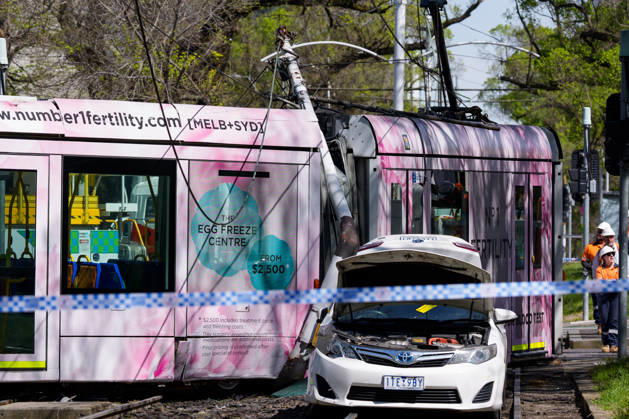 October 15, 2026, Melbourne, Victoria, Australia: A tram is derailed after a collision with a car during the morning peak hour on Victoria Parade in Melbourne. No Passengers were hurt but services have been disrupted. Melbourne Australia - ZUMAl303 20261015_aaf_l303_001 Copyright: xSydneyxLowx
