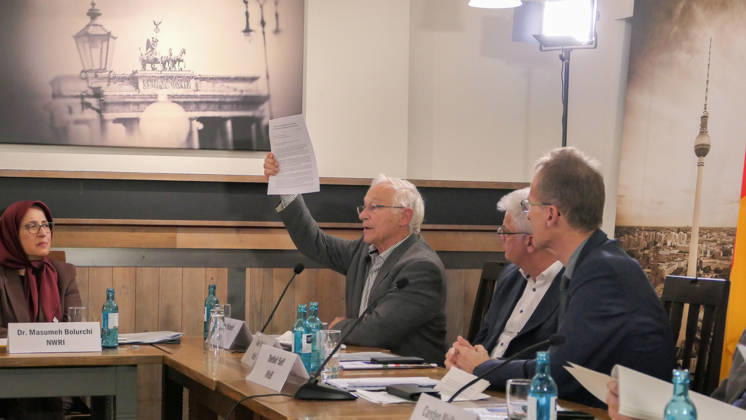 October 14, 2026, Berlin, Germany: Former German Bundestag Member, Martin Patzelt raises the open letter signed by 80 prominent German political and civic figures during his keynote speech. The conference, titled Iran in Crisis: The Democratic Solution and Germany s Responsibility, was organized by the German Solidarity Committee for a Free Iran (DSFI) and the Association of German-Iranians (GDI) at Hopfingerbräu am Brandenburger Tor in Berlin, Germany, on October 14, 2026. The conference brought together German federal lawmakers, former diplomats, and witnesses to discuss human rights, democratic prospects for Iran, and an open letter signed by 80 German dignitaries protesting the Friedrich Naumann Foundation s controversial plan to p - ZUMAs197 20261014_aaa_s197_465 Copyright: xSiavoshxHosseinix