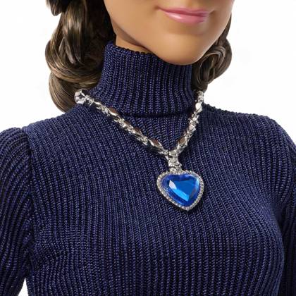 Céline Dion gets her own Barbie doll based on her 1998 Oscars look Céline Dion gets her own Barbie doll based on her 1998 Oscars look., , Toymaker Mattel has announced the legendary Canadian singer is being honored with a Barbie Signature doll., , Céline’s doll wears a long-sleeve navy-blue gown and a necklace inspired by the blue heart-shaped diamond necklace, capturing her look as My Heart Will Go On from movie blockbuster Titanic won Best Original Song at the 1998 Academy Awards., , Céline said: It is a true honor to join the Barbie legacy with a doll inspired by one of the most meaningful moments of my career., , I hope this doll inspires everyone to express themselves with confidence, follow their dreams and believe in the power of Copyright: xThexMegaxAgencyxMattelxInc Megax