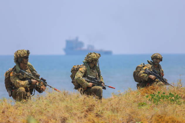 Indonesia-Australia Military Drill Australian Defense Force (ADF) personnel take part in a joint military exercise with the Indonesia Army at Banongan beach in Situbondo, Indonesia, on October 15, 2026. The exercise, named Keris Woomera 2026, is a form of diplomacy between Indonesia and Australia in the military field. The exercise is part of efforts to strengthen defense cooperation between Indonesia and Australia, particularly in addressing regional security challenges. Situbondo Indonesia  Copyright: xSuryantoxPutramudjix originalFilename: putramudji-notitle261015_npXzL.jpg