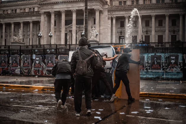 October 15, 2026, Buenos Aires, Buenos Aires, Argentina: Police forces deploy tear gas, water cannon trucks and rubber bullets against demonstrators during the Fifth Federal University March near Congress, as protesters demand the implementation of the University Funding Law and oppose President Javier Milei™s austerity policies. The protest takes place amid the government™s broader deregulation agenda, including Decree 70 2023 Buenos Aires Argentina - ZUMAf175 20261015_zip_f175_008 Copyright: xDaniellaxFernandezxRealinx