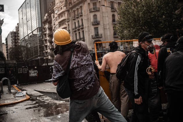 October 15, 2026, Buenos Aires, Buenos Aires, Argentina: Police forces deploy tear gas, water cannon trucks and rubber bullets against demonstrators during the Fifth Federal University March near Congress, as protesters demand the implementation of the University Funding Law and oppose President Javier Milei™s austerity policies. The protest takes place amid the government™s broader deregulation agenda, including Decree 70 2023 Buenos Aires Argentina - ZUMAf175 20261015_zip_f175_017 Copyright: xDaniellaxFernandezxRealinx