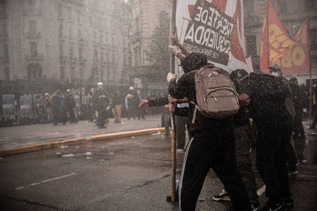 October 15, 2026, Buenos Aires, Buenos Aires, Argentina: Police forces deploy tear gas, water cannon trucks and rubber bullets against demonstrators during the Fifth Federal University March near Congress, as protesters demand the implementation of the University Funding Law and oppose President Javier Milei™s austerity policies. The protest takes place amid the government™s broader deregulation agenda, including Decree 70 2023 Buenos Aires Argentina - ZUMAf175 20261015_zip_f175_021 Copyright: xDaniellaxFernandezxRealinx