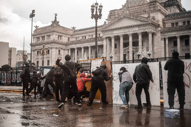 October 15, 2026, Buenos Aires, Buenos Aires, Argentina: Police forces deploy tear gas, water cannon trucks and rubber bullets against demonstrators during the Fifth Federal University March near Congress, as protesters demand the implementation of the University Funding Law and oppose President Javier Milei™s austerity policies. The protest takes place amid the government™s broader deregulation agenda, including Decree 70 2023 Buenos Aires Argentina - ZUMAf175 20261015_zip_f175_025 Copyright: xDaniellaxFernandezxRealinx