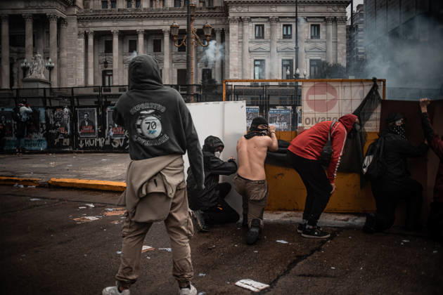 October 15, 2026, Buenos Aires, Buenos Aires, Argentina: Police forces deploy tear gas, water cannon trucks and rubber bullets against demonstrators during the Fifth Federal University March near Congress, as protesters demand the implementation of the University Funding Law and oppose President Javier Milei™s austerity policies. The protest takes place amid the government™s broader deregulation agenda, including Decree 70 2023 Buenos Aires Argentina - ZUMAf175 20261015_zip_f175_028 Copyright: xDaniellaxFernandezxRealinx