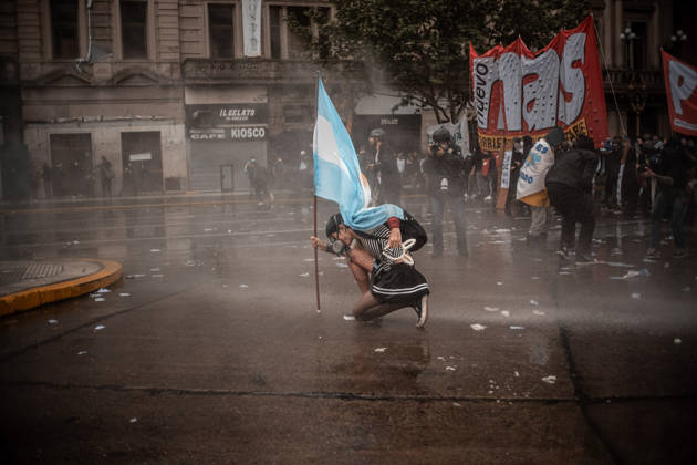 October 15, 2026, Buenos Aires, Buenos Aires, Argentina: Police forces deploy tear gas, water cannon trucks and rubber bullets against demonstrators during the Fifth Federal University March near Congress, as protesters demand the implementation of the University Funding Law and oppose President Javier Milei™s austerity policies. The protest takes place amid the government™s broader deregulation agenda, including Decree 70 2023 Buenos Aires Argentina - ZUMAf175 20261015_zip_f175_030 Copyright: xDaniellaxFernandezxRealinx