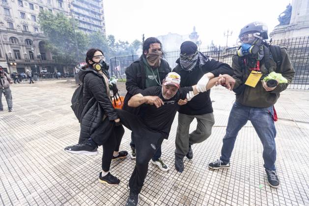 October 15, 2026, Ciudad Autonoma, Buenos Aires, argentina: police advanced on the Federal University March..As the legislative session was underway, a disproportionate police operation was deployed in the vicinity of Congress..Tear gas, the advance of water cannons, motorcycle units, and rubber bullets were used against protesters. There was targeted aggression toward photojournalists, as well as the arbitrary detention of minors..A brutal police operation foreshadowed the crackdown that federal forces shortly after 3:30 p.m. unleashed upon protesters who had gathered at Plaza Congreso to demand the implementation of the University Financing Law and to oppose the austerity measures of Javier Milei...Rentals, private healthcare plans, c - ZUMAc230 20261015_znp_c230_018 Copyright: xVirginiaxChailex