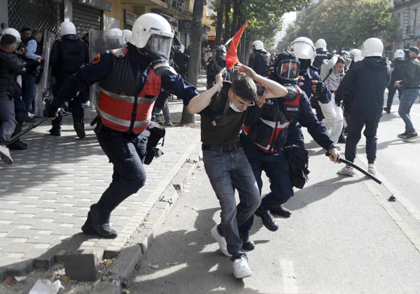Protesters Clash with Police During a Demonstration in Tirana, Albania. Riot police detain a protester during an anti-government demonstration in central Tirana on October 15, 2026, as protests continued for a third consecutive day over university conditions and demands for the resignation of Albanian Prime Minister Edi Rama. The latest rally follows two nights of violence in the capital, during which protesters and riot police clashed, police used water cannons and tear gas, and demonstrators damaged government offices and shops and set fire to several buildings. Light Studio Agency Malton Dibra Tirana Albania Copyright: xLightxStudioxAgencyx xMaltonxDibrax