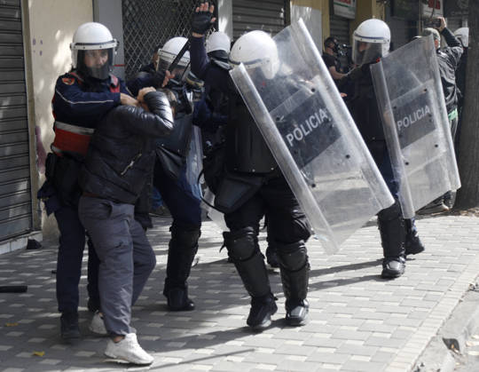 Protesters Clash with Police During a Demonstration in Tirana, Albania. Riot police detain a protester during an anti-government demonstration in central Tirana on October 15, 2026, as protests continued for a third consecutive day over university conditions and demands for the resignation of Albanian Prime Minister Edi Rama. The latest rally follows two nights of violence in the capital, during which protesters and riot police clashed, police used water cannons and tear gas, and demonstrators damaged government offices and shops and set fire to several buildings. Light Studio Agency Malton Dibra Tirana Albania Copyright: xLightxStudioxAgencyx xMaltonxDibrax