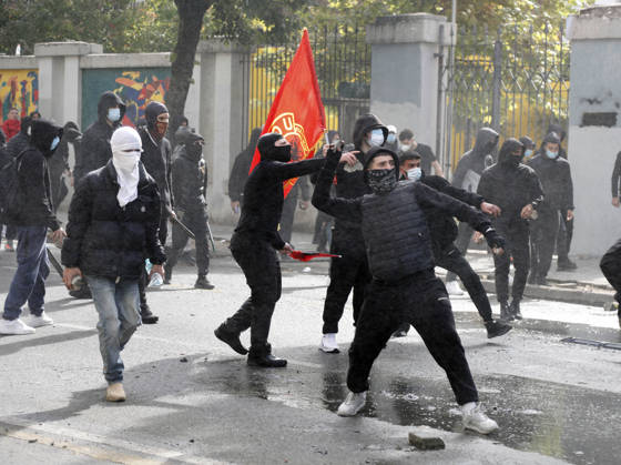 Protesters Clash with Police During a Demonstration in Tirana, Albania. Protesters throw stones at riot police during an anti-government demonstration in central Tirana on October 15, 2026, as protests continued for a third consecutive day over university conditions and demands for the resignation of Albanian Prime Minister Edi Rama. The latest rally follows two nights of violence in the capital, during which protesters and riot police clashed, police used water cannons and tear gas, and demonstrators damaged government offices and shops and set fire to several buildings. Light Studio Agency Malton Dibra Tirana Albania Copyright: xLightxStudioxAgencyx xMaltonxDibrax